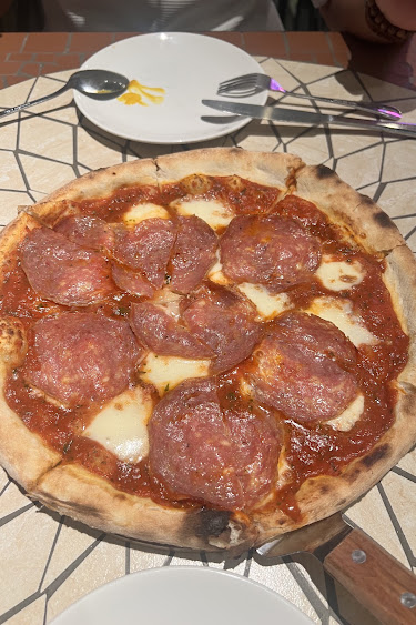 Salami pizza in Vy Phan’s Google review at Thanh My Loi